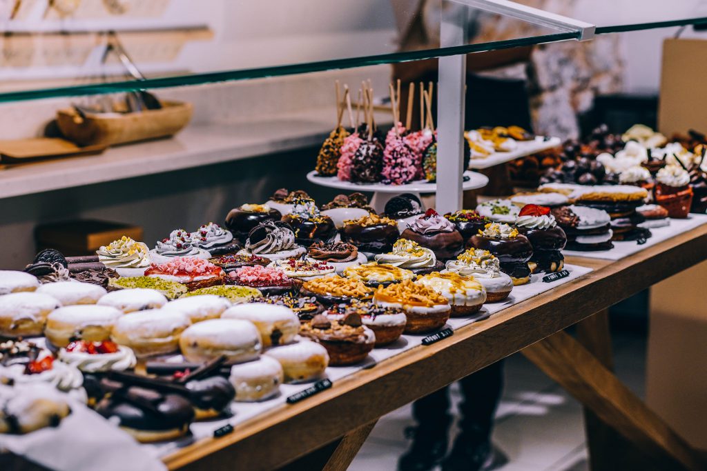 A bakery window filled with pastries.