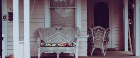 Wicker seating on a porch.