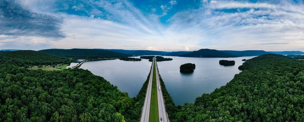 A reservoir with a highway passing over it.