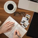 Writing in a notebook