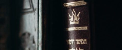 Hebrew book on a shelf