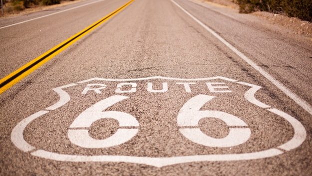 Route 66 painted in white on the road