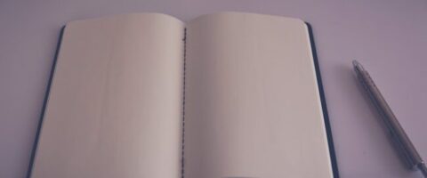 An open notebook with blank pages