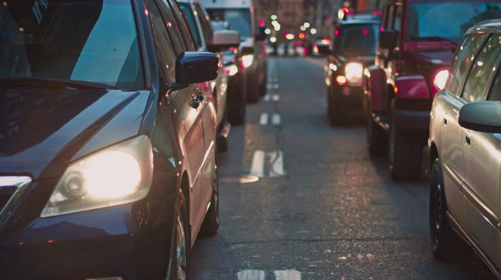 A line of cars waiting in traffic.